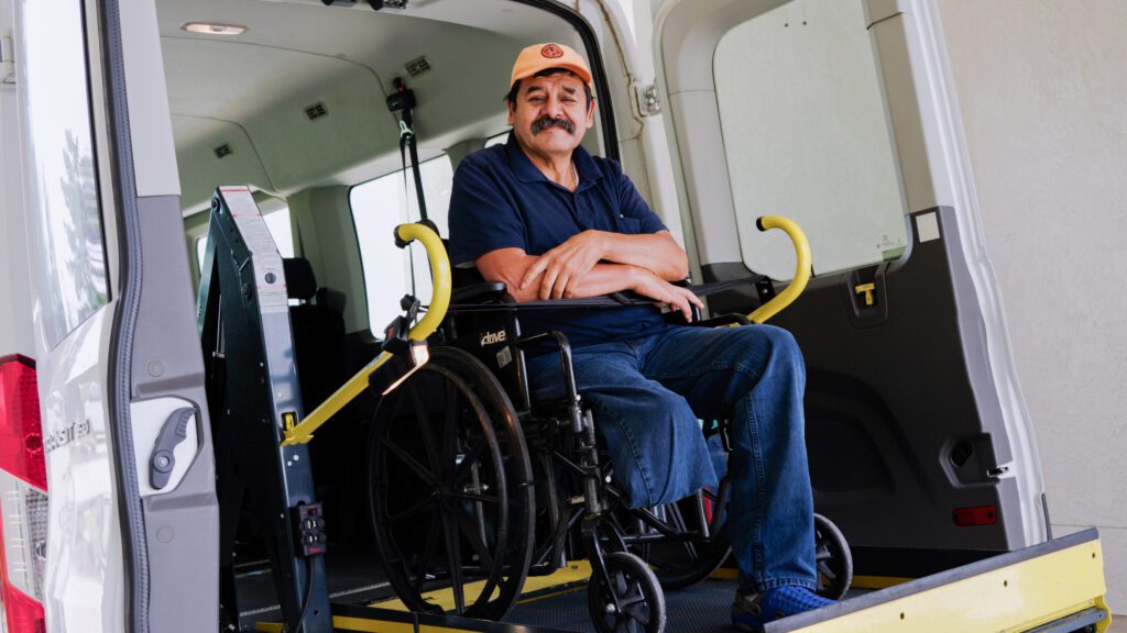 A man in a wheel chair using the respite care services at a skilled nursing facility